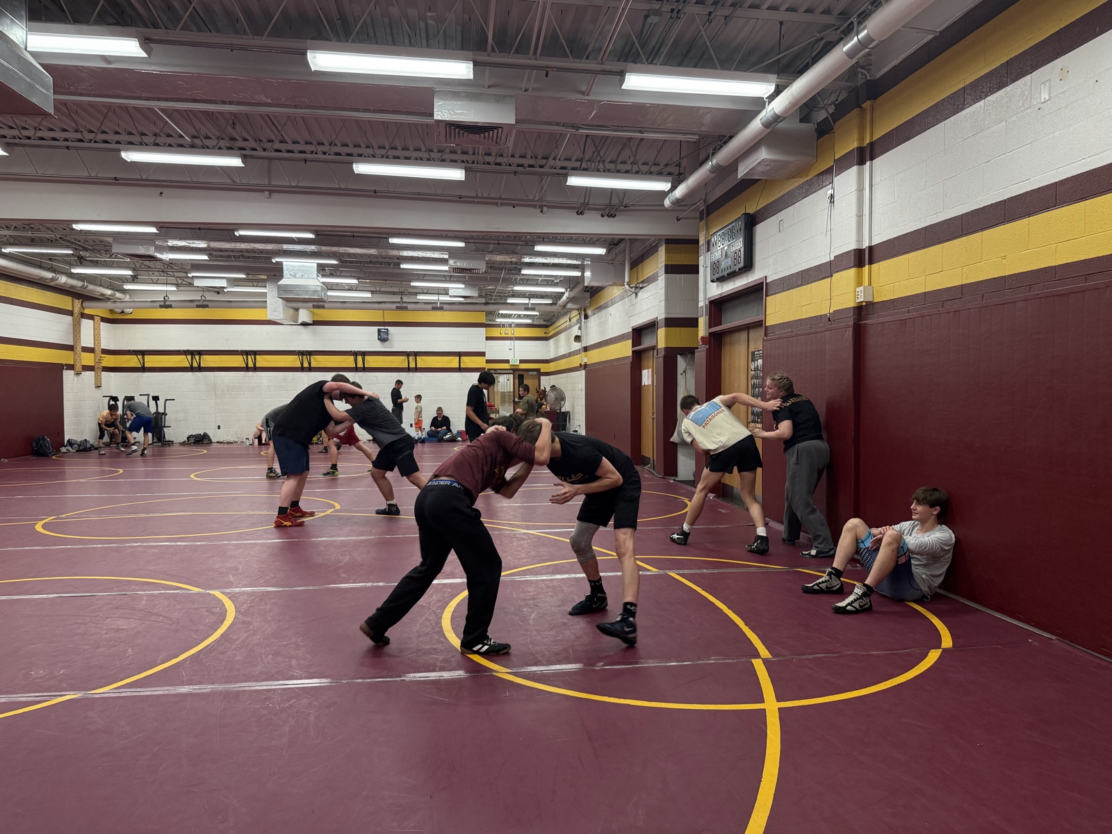 Competitive wrestlers at practice